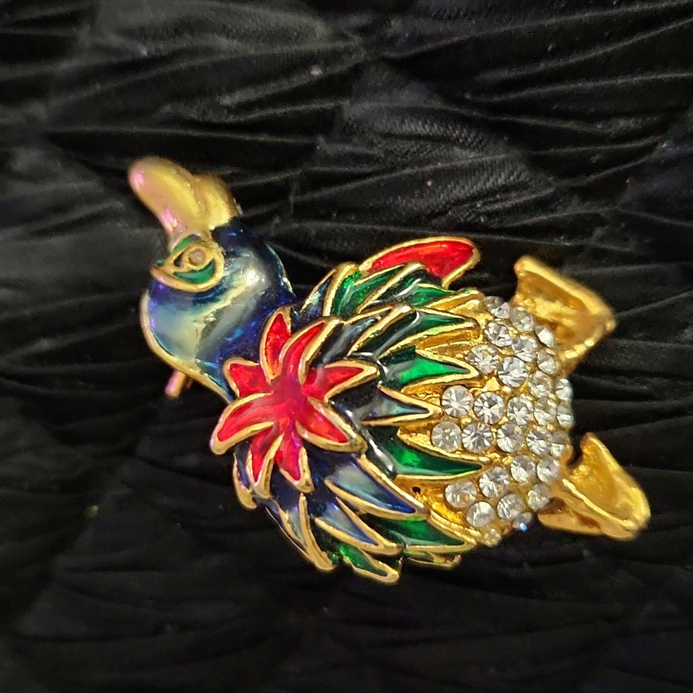 Cute Vintage penguin with red poinsettia. Rhinestones.